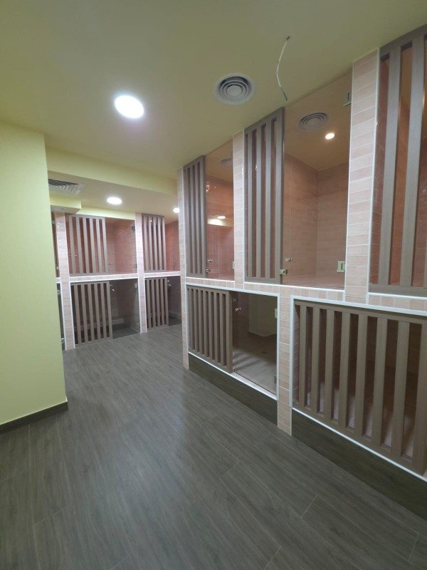 Daycare suites with tiled walls and glass doors